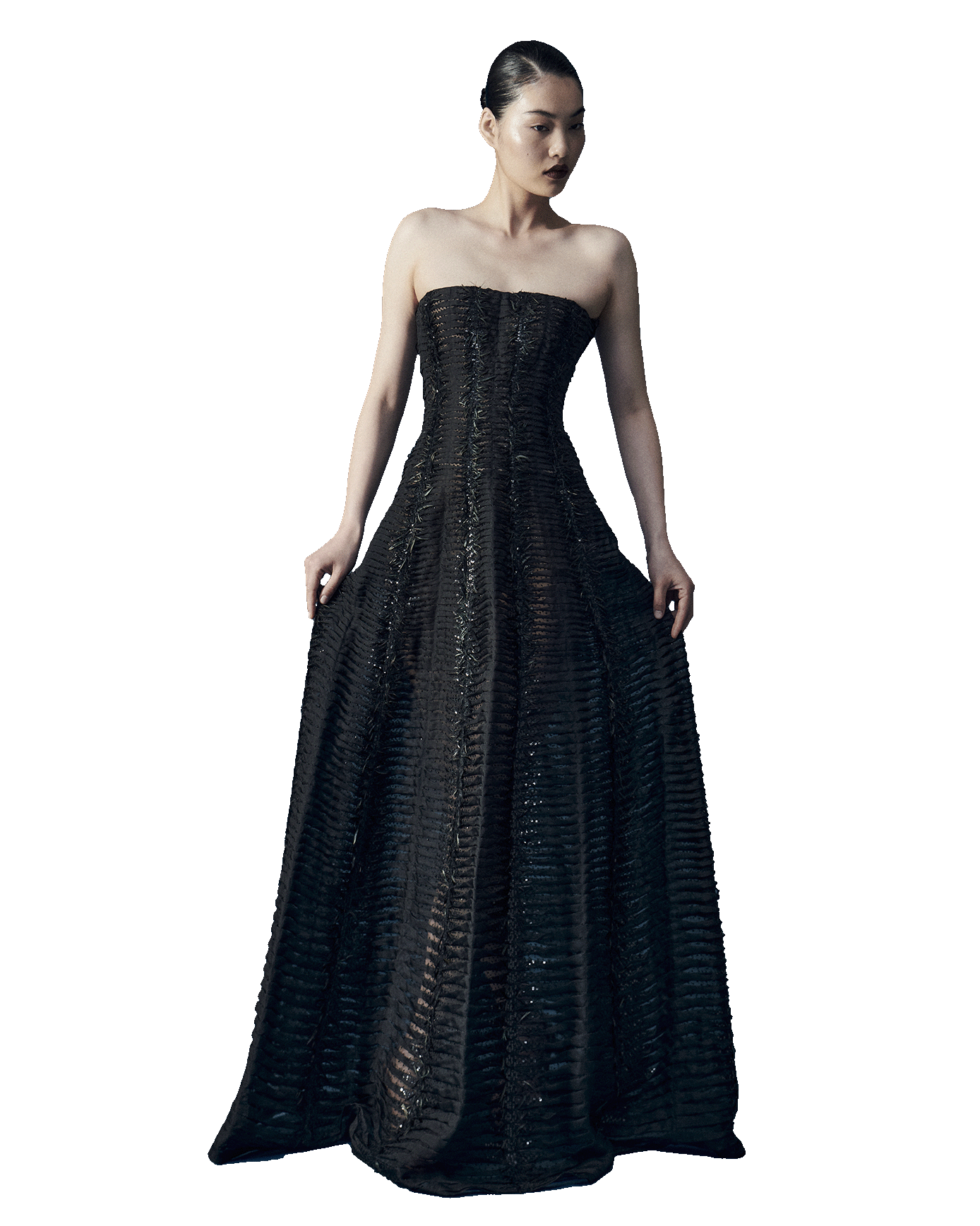 Black silk organza dress entirley decked out in an extraordinary technique of regular micro pleats embroidered with sequins, black crystal beads and dark green iridescend feathers constructed on a corset with straight neckline.